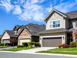 Residential Neighborhood with Modern Garage Doors – Garage Door Repair Coon Rapids MN Row of suburban homes with freshly maintained garage doors in Coon Rapids, MN, representing reliable service by Garage Door Repair Coon Rapids.